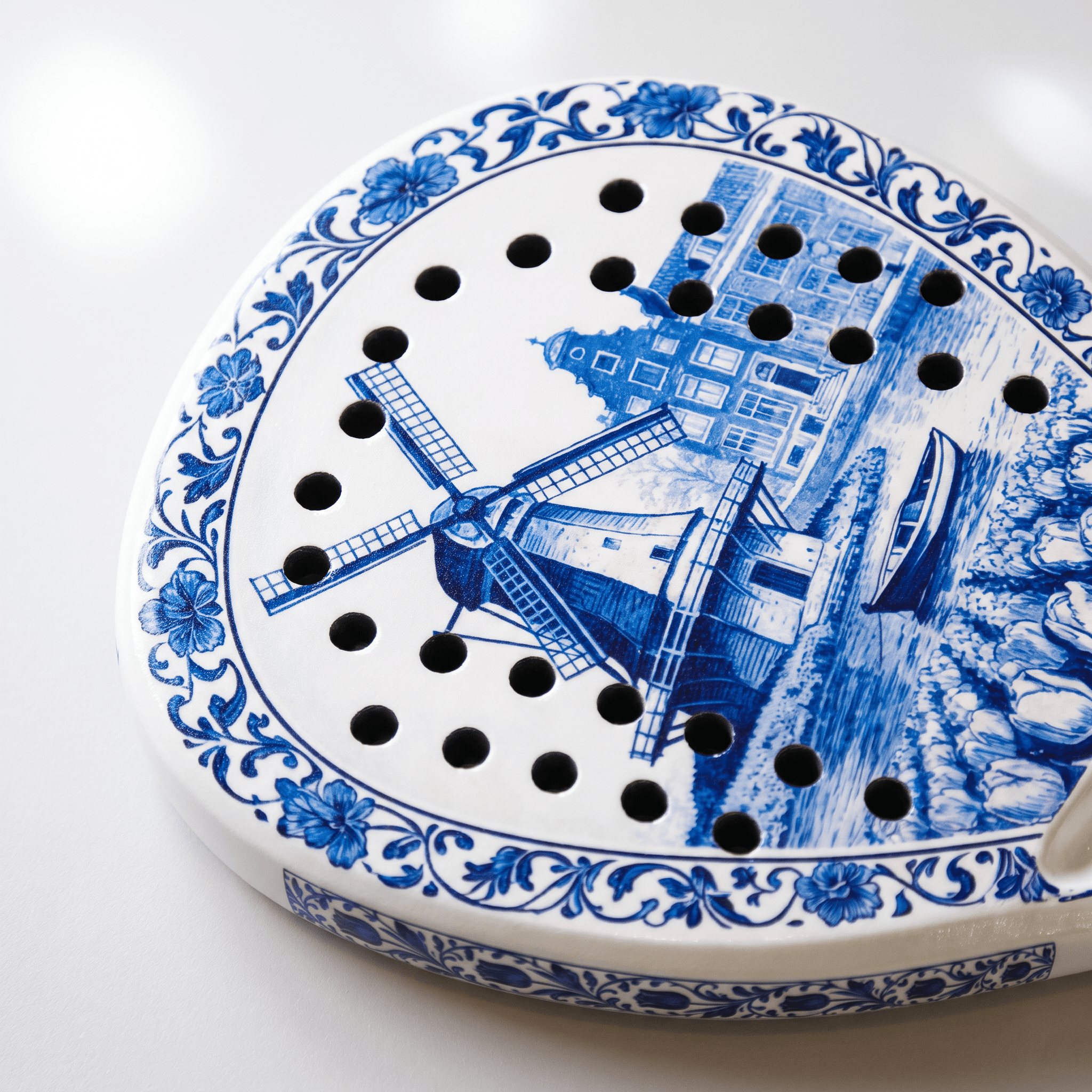 Detalhes da raquete de padel em azul de Delft